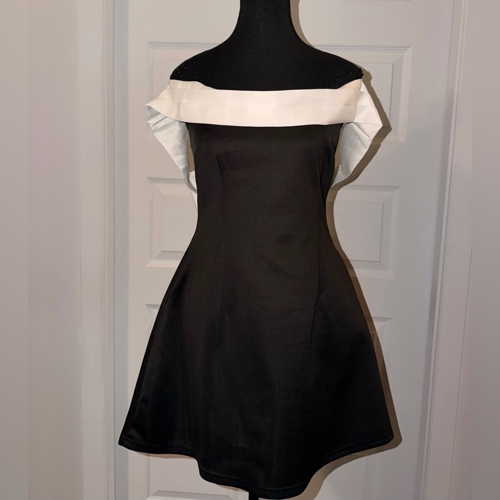 Elegant Black and White Off-Shoulder Dress with Oversized Bow 🖤